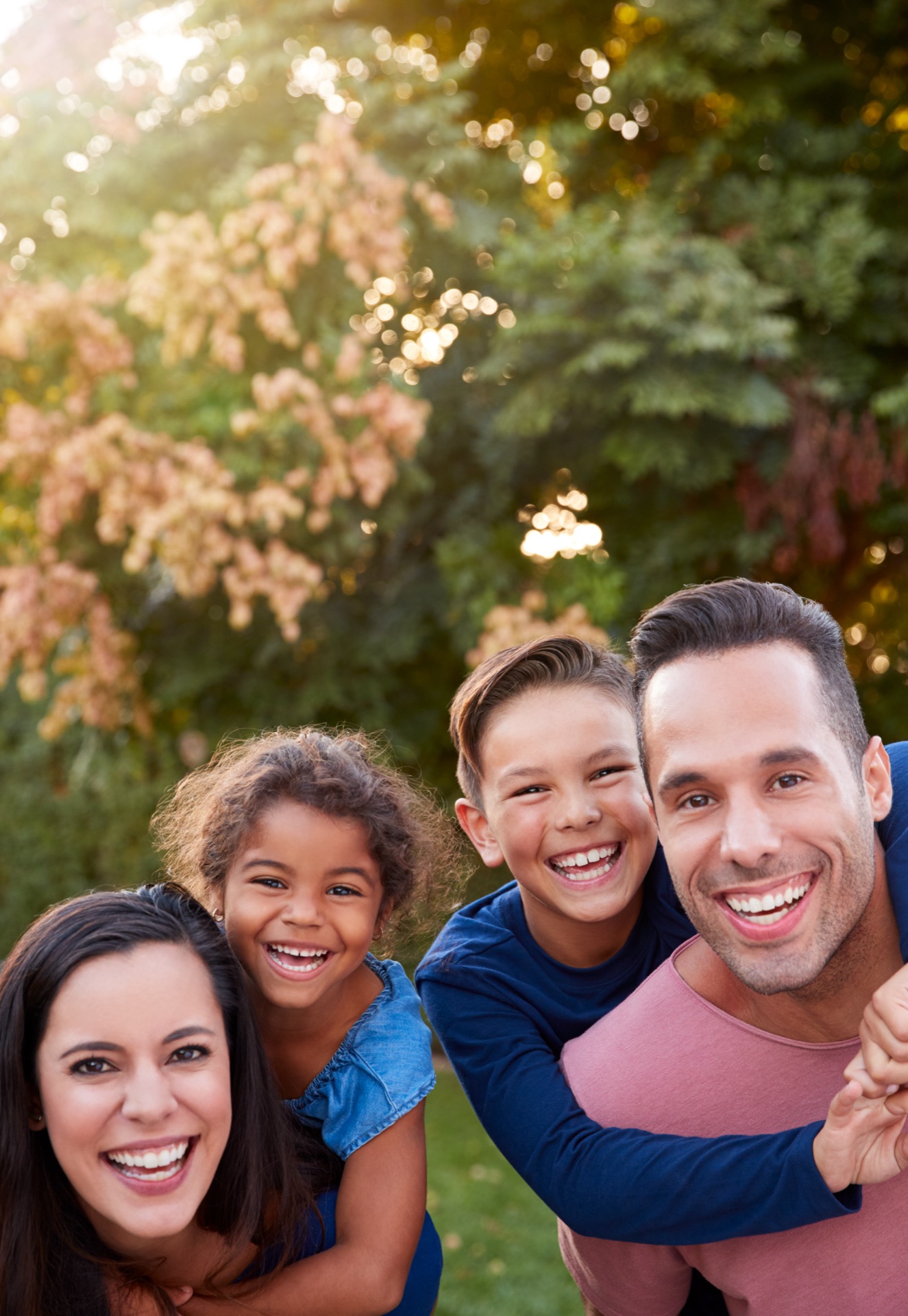 Smiling family with parents and grandparents
